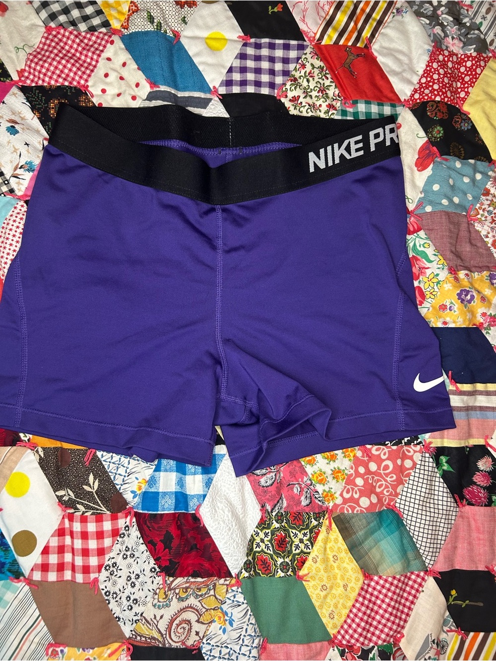 Nike Purple Dri-FIT workout shorts with Black Waistband